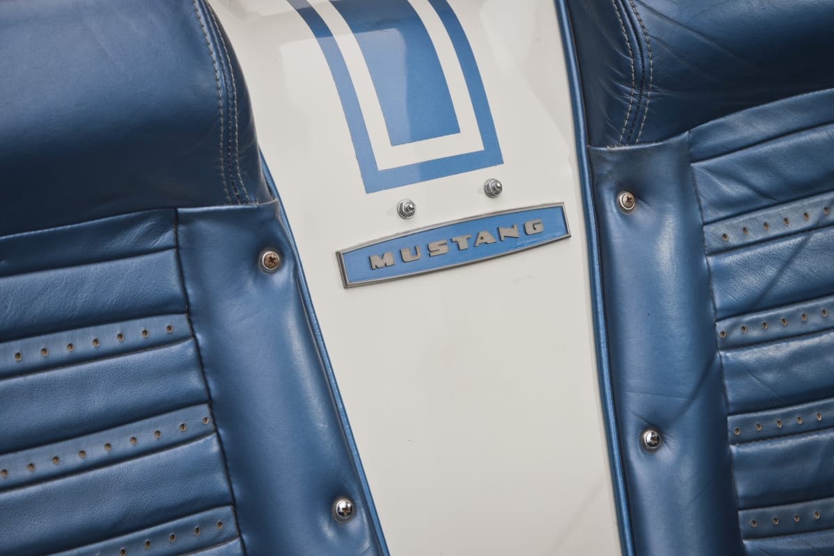 Mustang I perforated leather seat with blue stitching